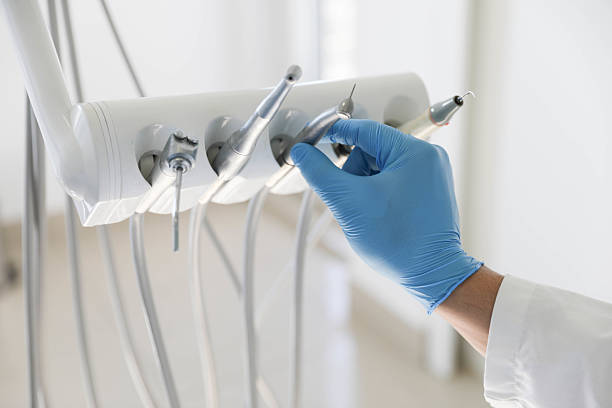Professional Tooth Extraction technician working in Centerville, IA